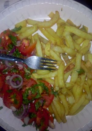 A picture of Chips with Kachumbari.