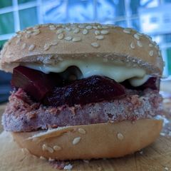 A picture of Corned beef and pickled beetroot sandwich.