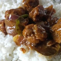 Meat balls gravy with rice A picture of Meat balls gravy with rice.