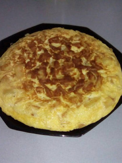Una foto de Tortilla patata con cebolla caramelizada