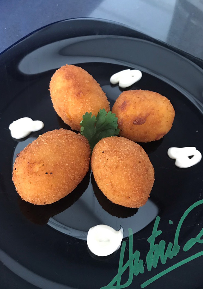 Una foto de Croquetas de calabaza y parmesano