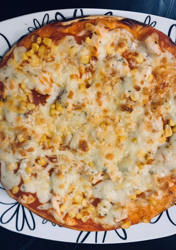 Una foto de Pizza de pollo y kebab