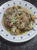Sorrentinos con harina integral, rellenos de cordero y salsa de vino blanco