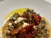 A picture of sun dried tomato sauce