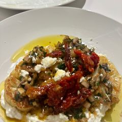 A picture of Cauliflower Steak (or Tofu Slices) with Chimichurri and Feta.