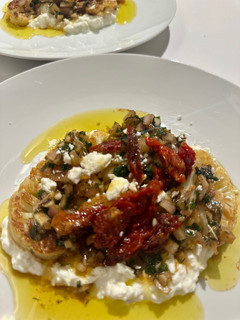 A picture of Cauliflower Steak (or Tofu Slices) with Chimichurri and Feta.