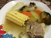Una foto de caldo de puchero