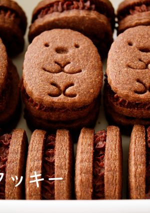 A picture of Chocolate Sandwich Cookies / Crispy Cocoa Cookies filled with a Smooth Chocolate Cheese Cream.
