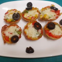 A picture of Healthy & Protein Rich Pizza Cups -- an after school snack For Kids.
