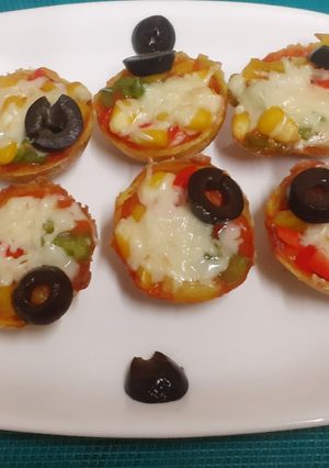 A picture of Healthy & Protein Rich Pizza Cups -- an after school snack For Kids.