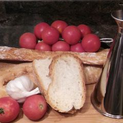 A picture of Bread rubbed with Tomato - Pa amb tomaquet.
