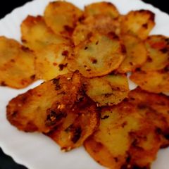 A picture of Spicy fried potatoes.