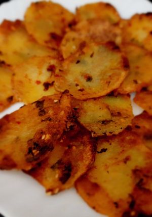 A picture of Spicy fried potatoes.