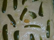 Una foto de rajas de chile morrón
