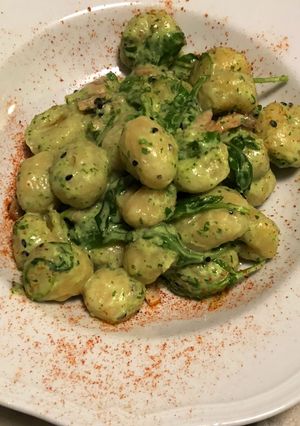 A picture of Gnocchi with Salmon, Arugula, and Black Sesame Seeds.