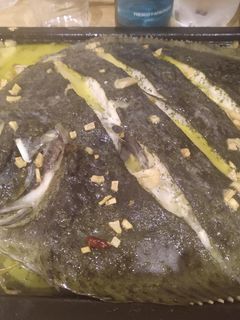 Una foto de Rodaballo al horno con txakoli