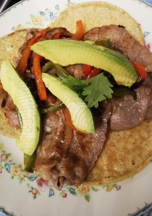 A picture of Rib Eye Tacos with Peppers.