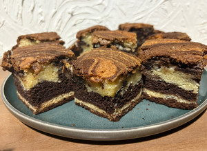 Una foto de Torta Dulce Marmolada De Vainilla y Cacao 🍫🍥