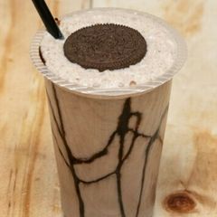 A picture of Oreo & ice-cream milkshake.