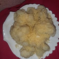 A picture of Simple cooked Cauliflower with Cheese.