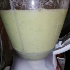 A picture of Cucumber, lemon, ginger and pineapple smoothie.