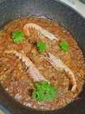 Paella de calamar y cigalas