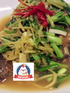 A picture of Pla Jian (Fried Fish with Three-Flavored Sauce).