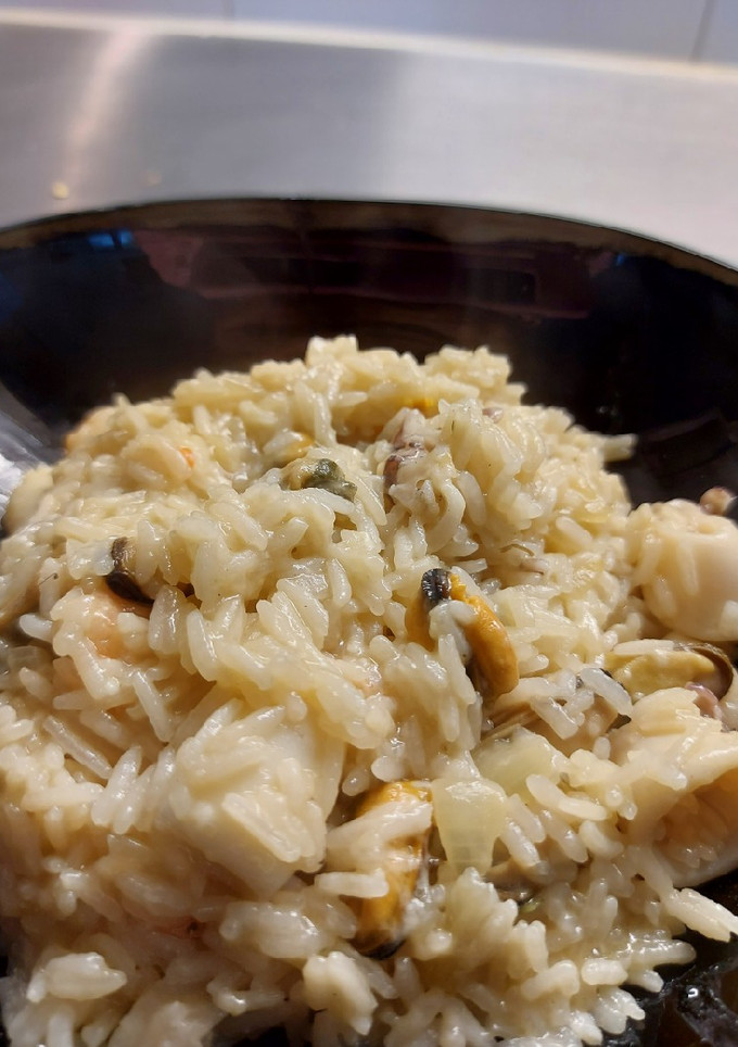 Una foto de Risotto frutti di mare 🦑🦐