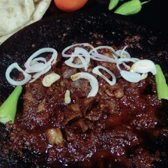 A picture of Tikka masala kaleji.