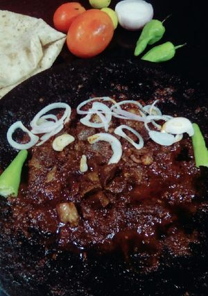 A picture of Tikka masala kaleji.