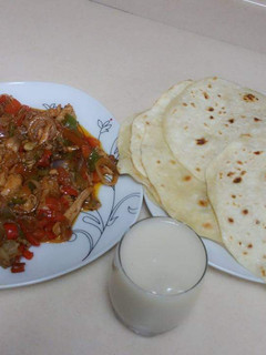 A picture of Khubus(bread)with chicken sauce.