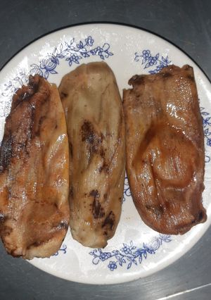 Una foto de Tamales de coloradito (mole rojo) estilo Cuilapam