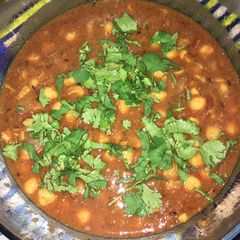 A picture of Chole (Mildly spiced tangy chickpeas).