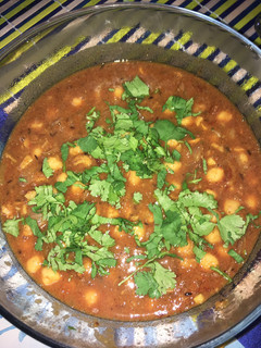 A picture of Chole (Mildly spiced tangy chickpeas).