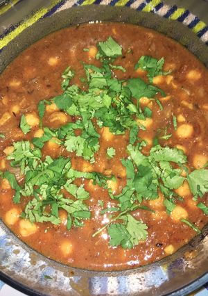 A picture of Chole (Mildly spiced tangy chickpeas).