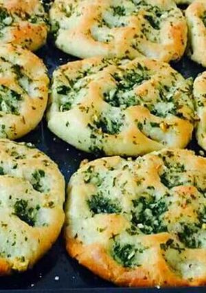 A picture of Baked Stuffed Spinach Aloo Kulcha Recipe.