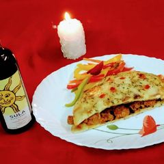 A picture of WINE ROASTED CHEESE BURST BBQ CHICKEN and NAAN SANDWICH.