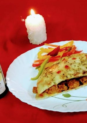 A picture of WINE ROASTED CHEESE BURST BBQ CHICKEN and NAAN SANDWICH.