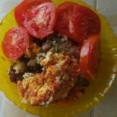 A picture of Egg rice with beans.
