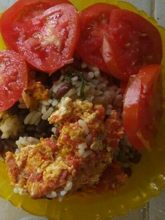 A picture of Egg rice with beans.