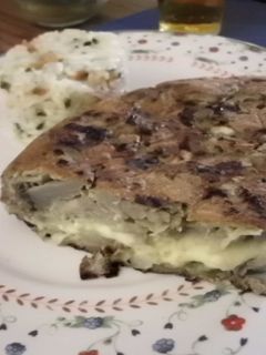 Una foto de Tortilla de Alcachofas rellena con Queso
