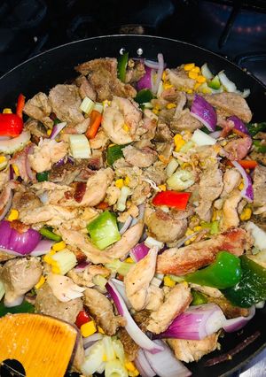 Una foto de Fajitas de Cerdo y Pollo