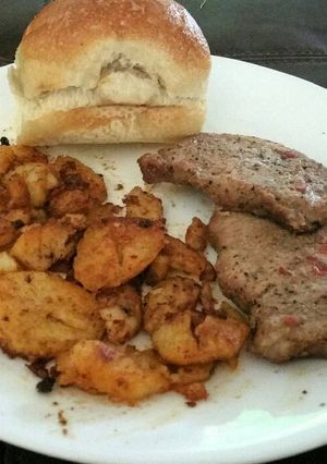 A picture of Sweet Porkchops and Savory Potato "Fries".