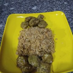 A picture of Chinese combo of Schezwan Fried Rice and Veg Gravy Manchurian.