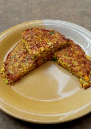 A picture of Grated plantain in eggs #plantainrecipecontest#.