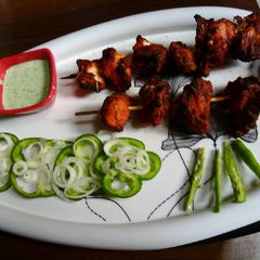 A picture of Red grill chicken.