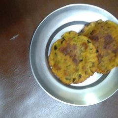 A picture of Moong meethi masala puri.