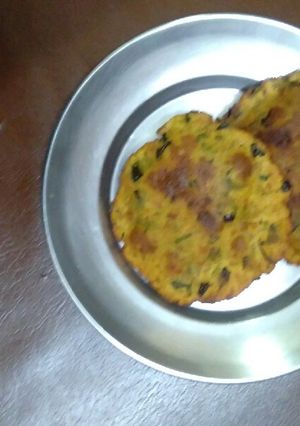 A picture of Moong meethi masala puri.