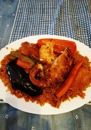 Una foto de Arroz con pescado "thieboudiene"