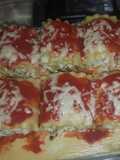 Rollos de lasaña relleno de pollo y queso